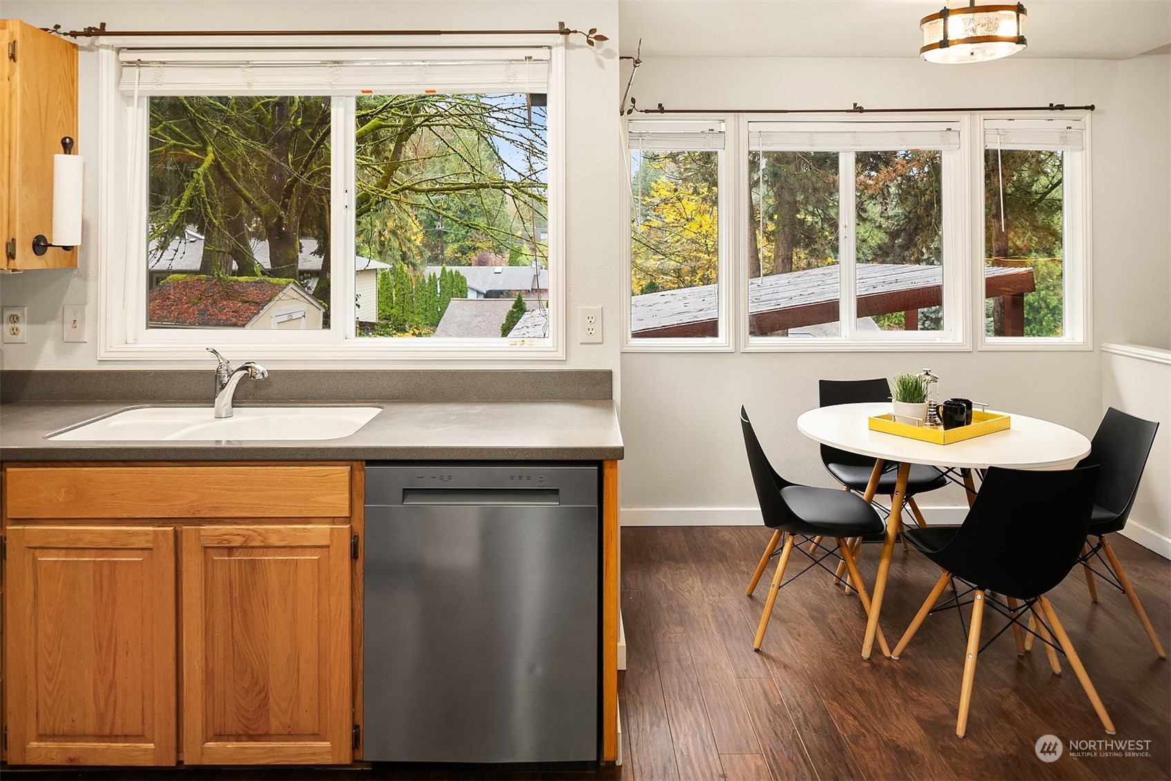 23122 20th Avenue Southeast Bothell, WA 98021 - Photo 15 of 35 a kitchen with a table chairs and wooden floor