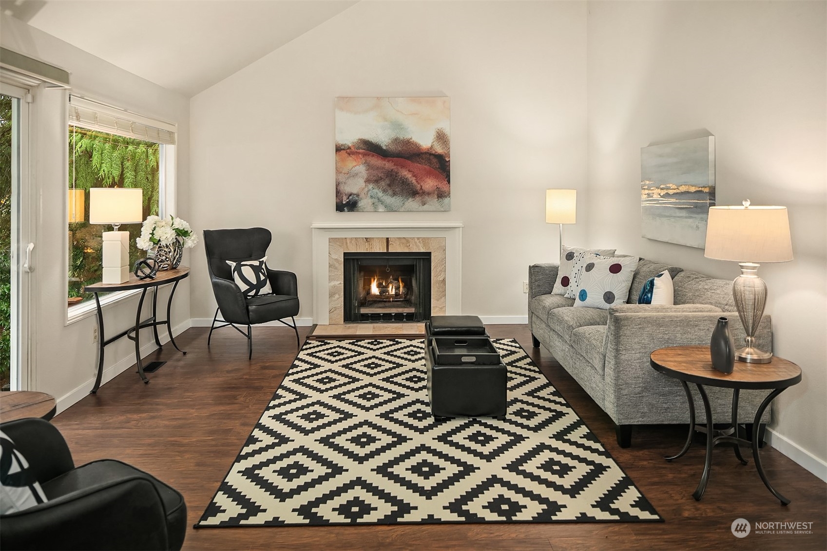 23122 20th Avenue Southeast Bothell, WA 98021 - Photo 17 of 35 a living room with furniture and a fireplace