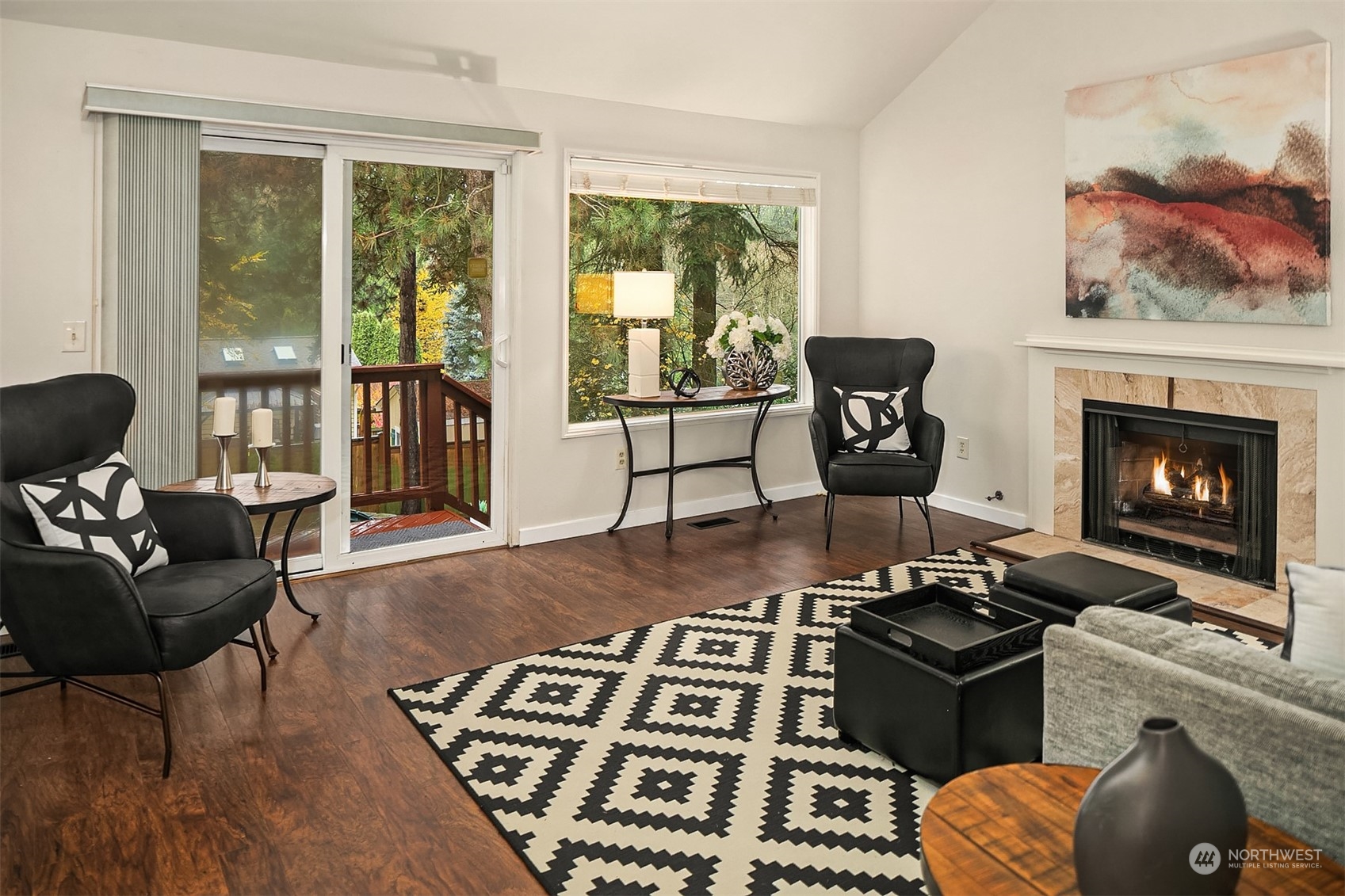 23122 20th Avenue Southeast Bothell, WA 98021 - Photo 18 of 35 a living room with furniture and a fireplace