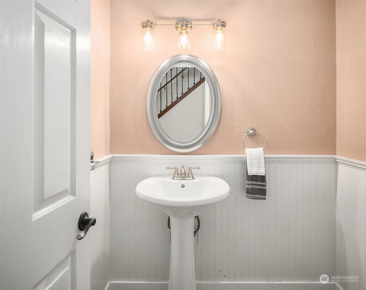 23122 20th Avenue Southeast Bothell, WA 98021 - Photo 19 of 35 a bathroom with a sink and a mirror