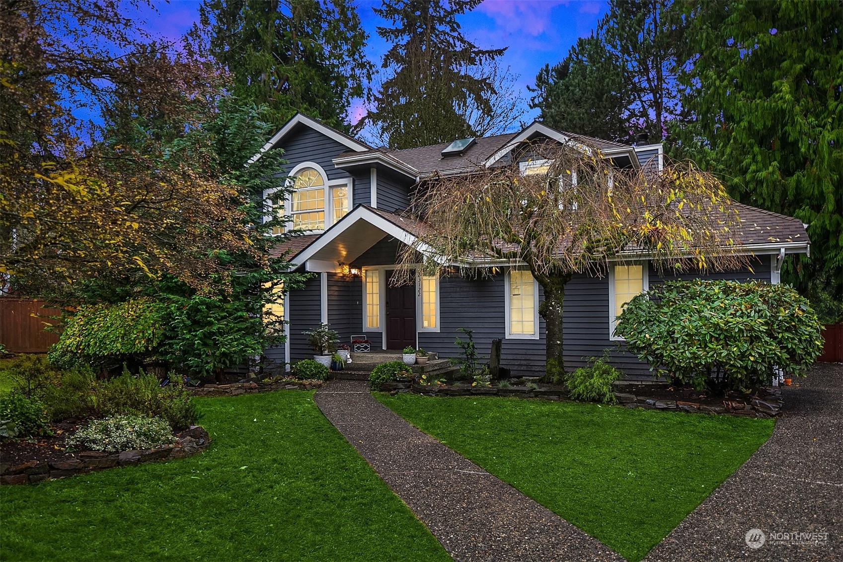 23122 20th Avenue Southeast Bothell, WA 98021 - Photo 2 of 35 a front view of a house with a yard and green space