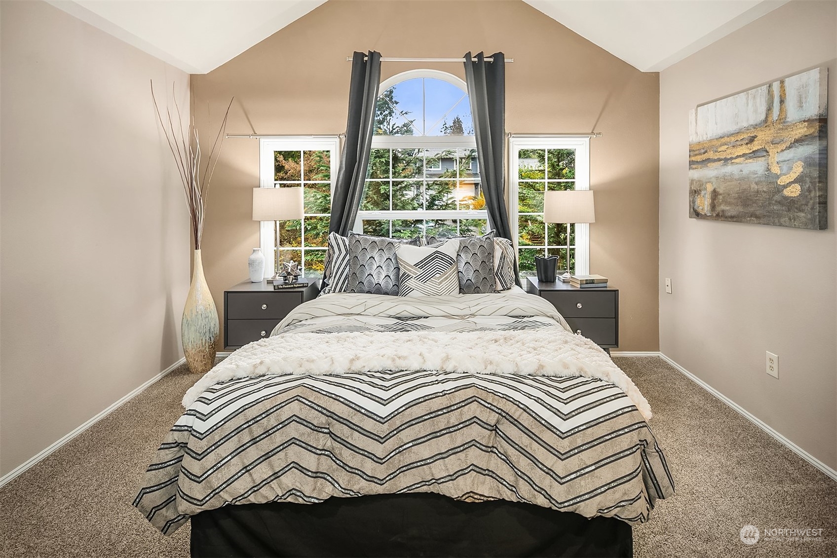 23122 20th Avenue Southeast Bothell, WA 98021 - Photo 23 of 35 a bedroom with a bed and a painting on the wall