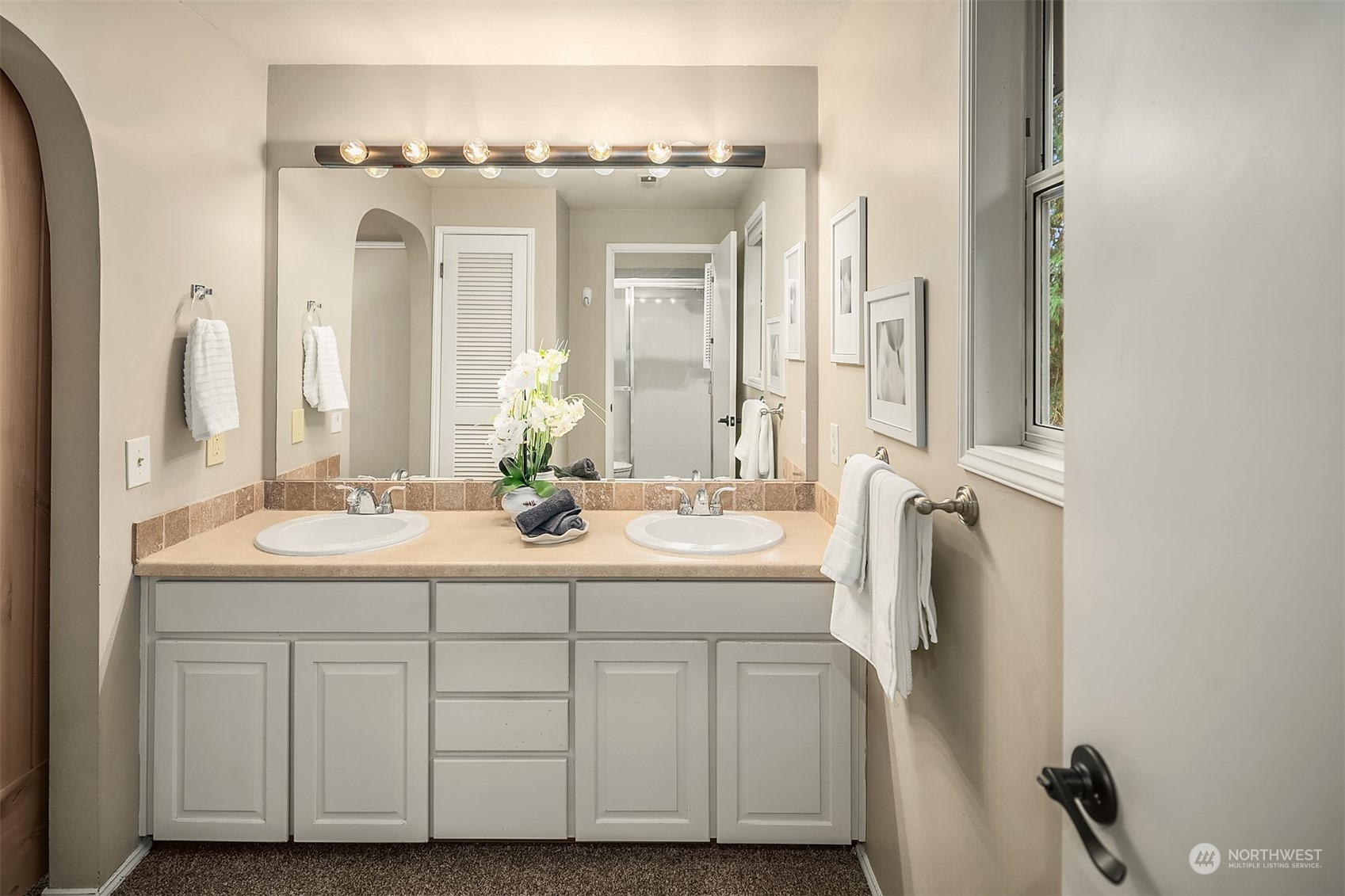 23122 20th Avenue Southeast Bothell, WA 98021 - Photo 25 of 35 a bathroom with a double vanity sink and a mirror