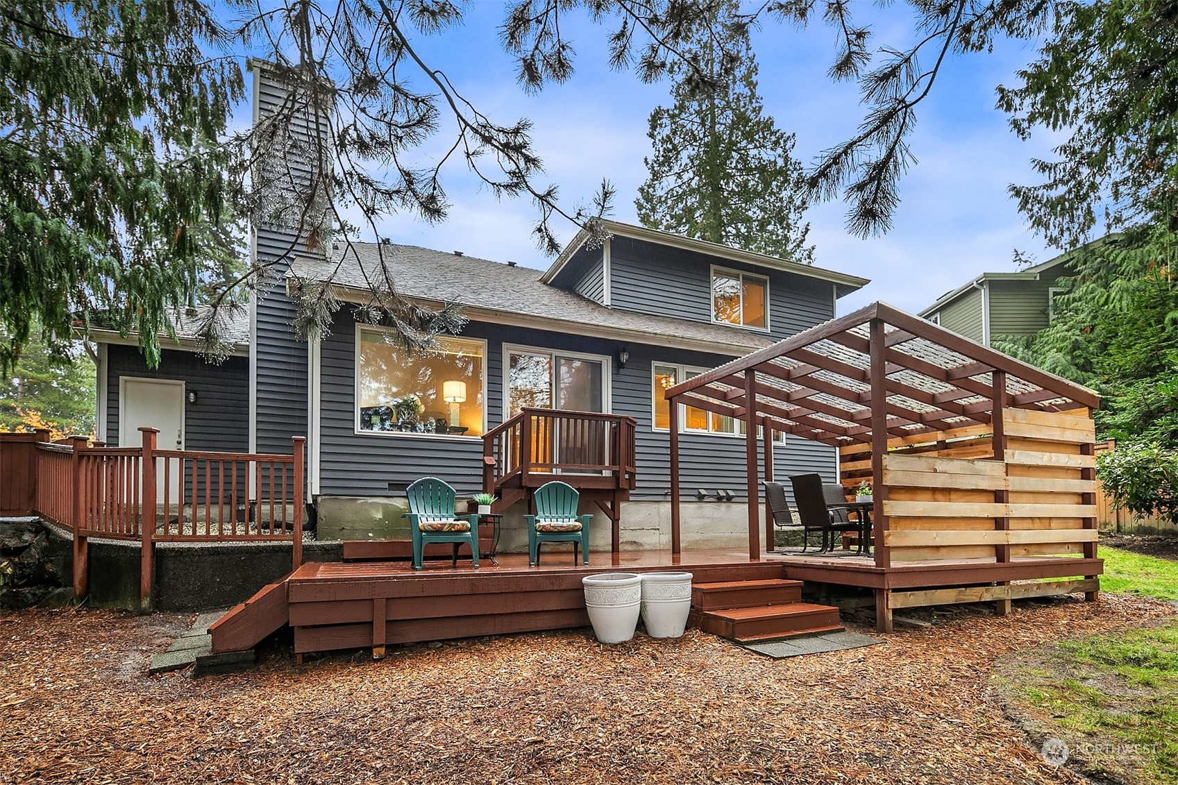 23122 20th Avenue Southeast Bothell, WA 98021 - Photo 30 of 35 a backyard of a house with barbeque oven and outdoor seating