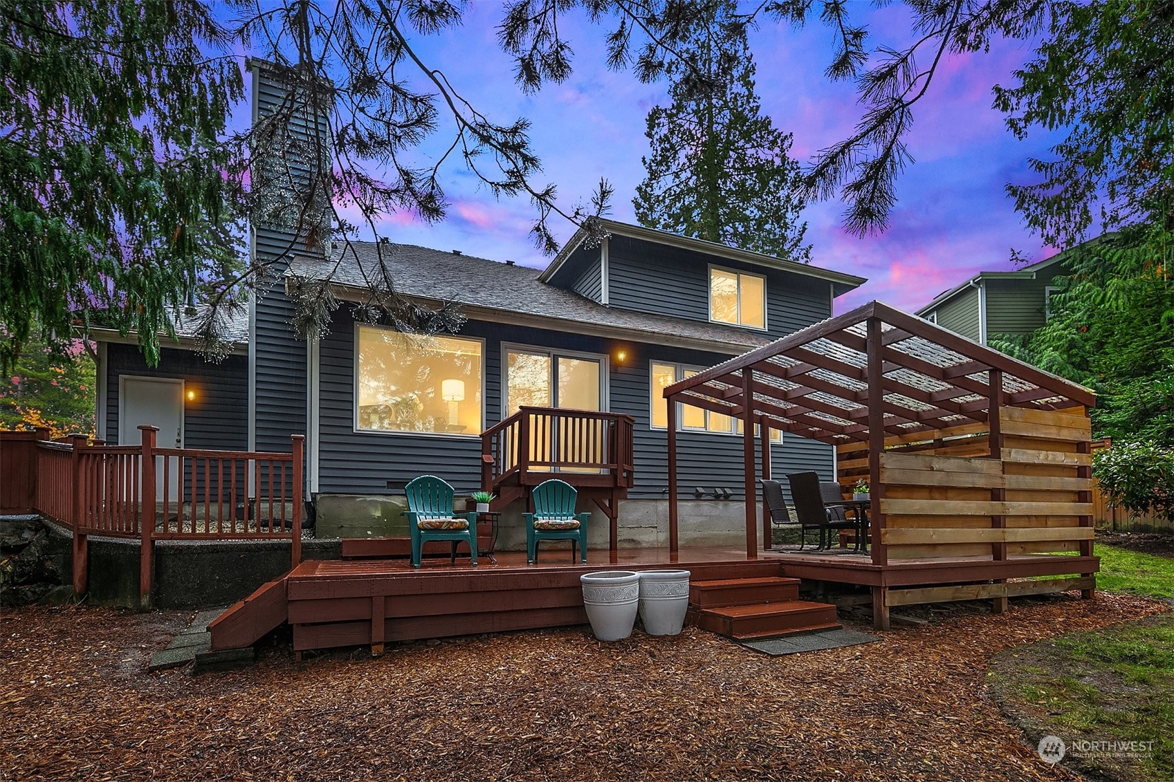 23122 20th Avenue Southeast Bothell, WA 98021 - Photo 31 of 35 a backyard of a house with barbeque oven table and chairs