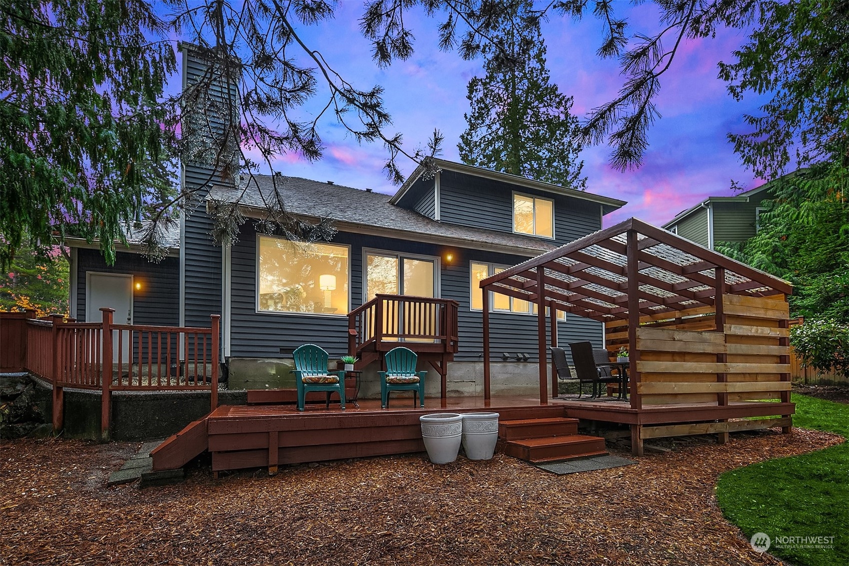23122 20th Avenue Southeast Bothell, WA 98021 - Photo 32 of 35 a backyard of a house with barbeque oven table and chairs