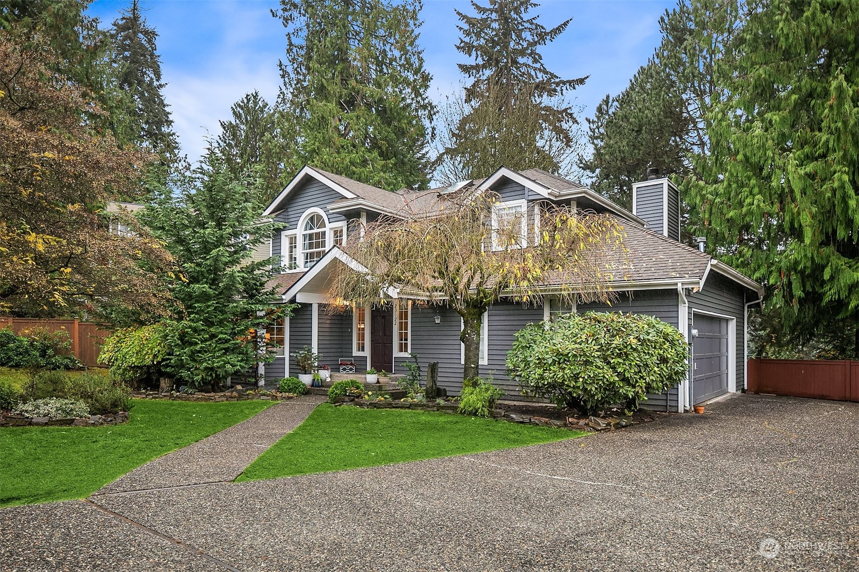 23122 20th Avenue Southeast Bothell, WA 98021 - Photo 6 of 35 a front view of house with yard and green space