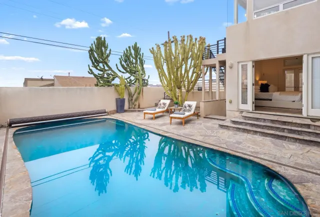 a view of a living room and a patio
