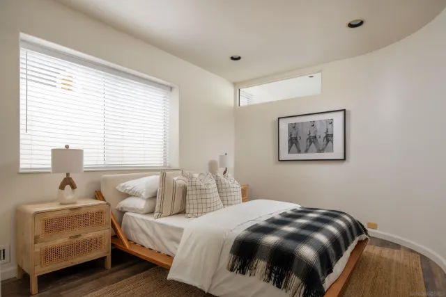 a view of a terrace with furniture and a view of the ocean