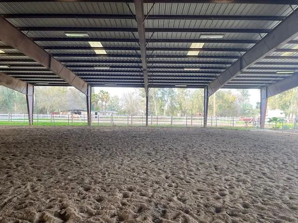 a view of a backyard of the house