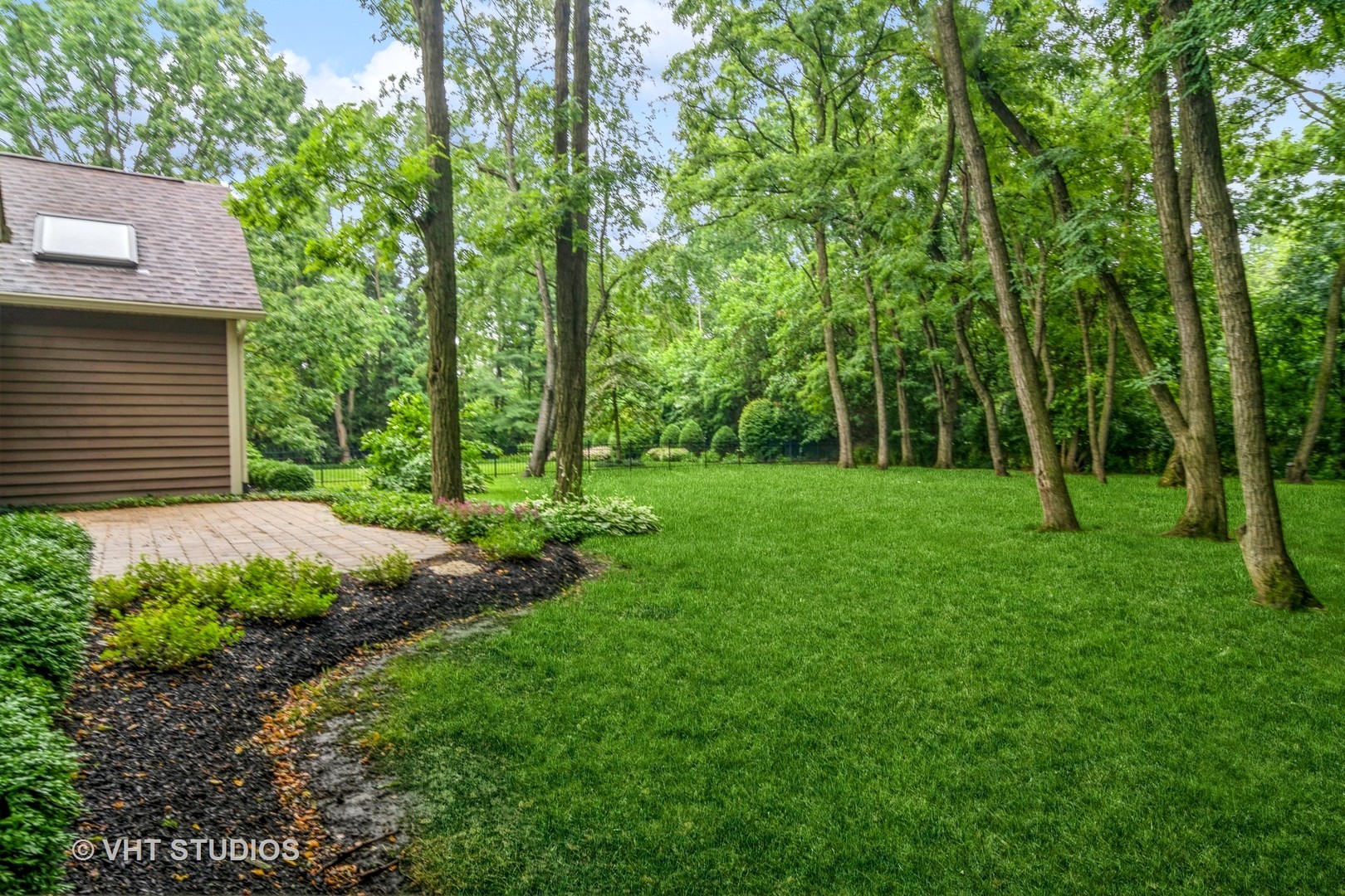980 Pinecrest Drive Sugar Grove, IL 60554 - Photo 2 of 38 a view of a backyard with large trees
