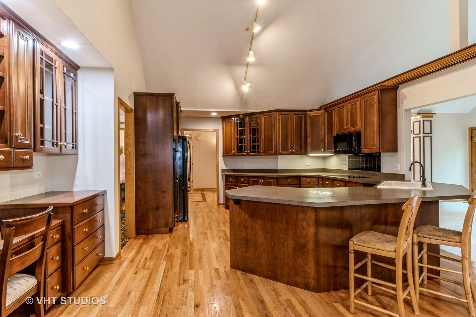 980 Pinecrest Drive Sugar Grove, IL 60554 - Photo 10 of 38 a kitchen with stainless steel appliances granite countertop a refrigerator a stove top oven a sink and dishwasher