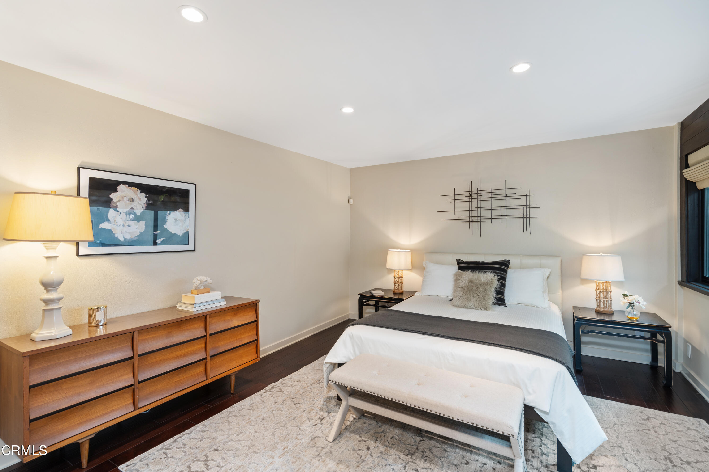 11915 Gorham Avenue, Unit 3 Los Angeles, CA 90049 - Photo 17 of 30 a bedroom with a bed and a night stand