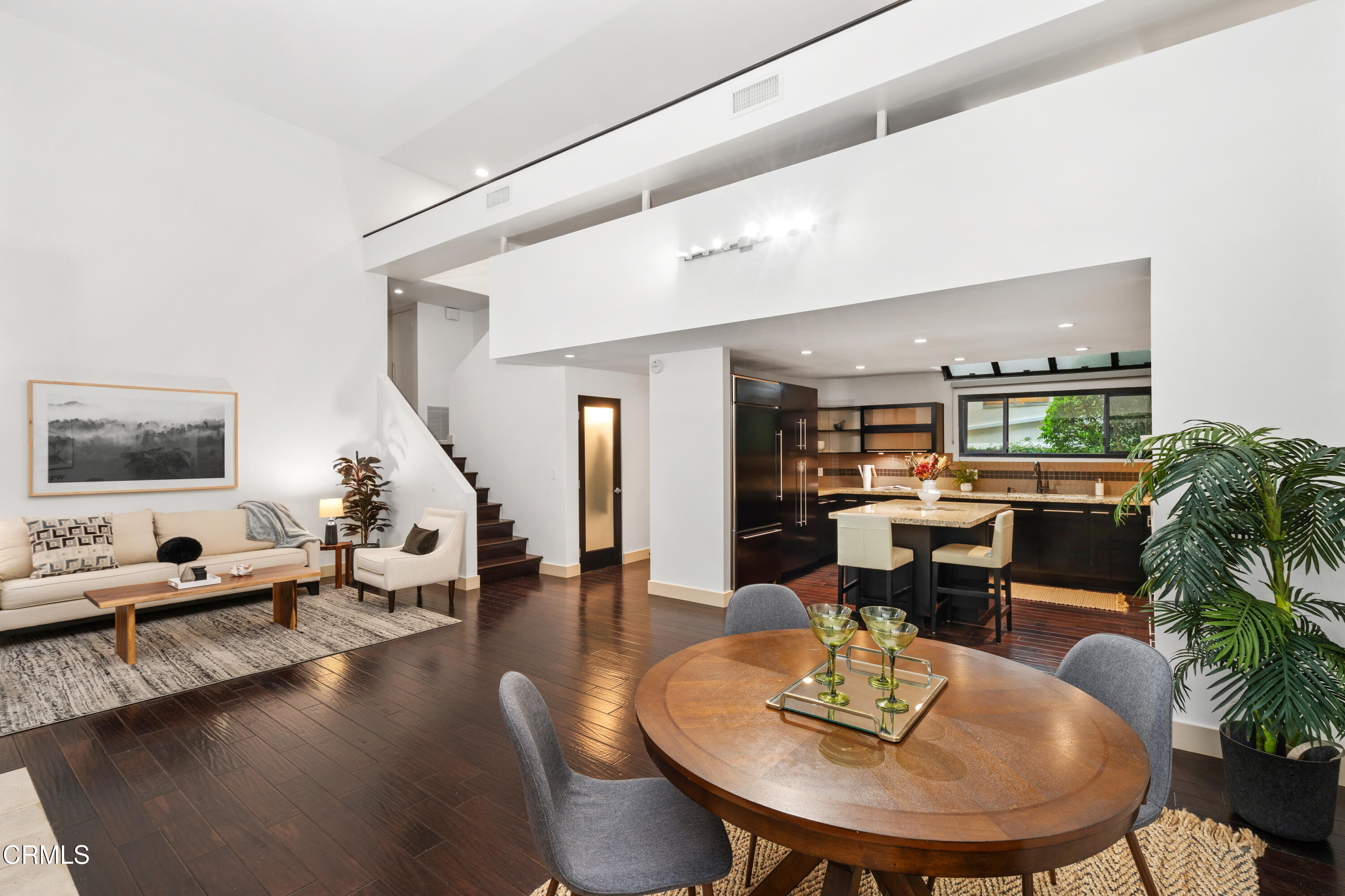 11915 Gorham Avenue, Unit 3 Los Angeles, CA 90049 - Photo 6 of 30 a living room with furniture and a wooden floor