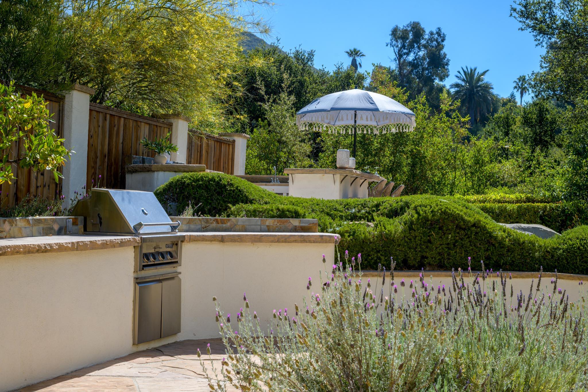 1444 Tunnel Road Santa Barbara, CA 93105 - Photo 5 of 24 a view of backyard with plants and outdoor seating