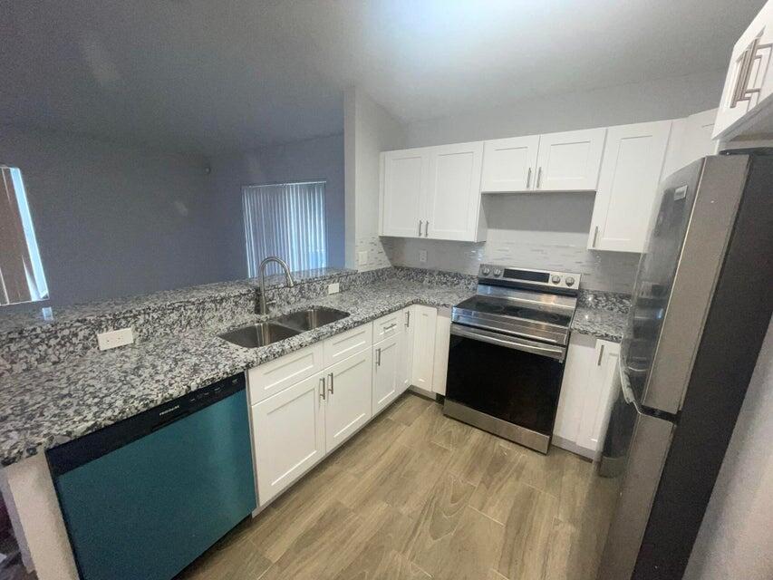1105 West 9th Street Riviera Beach, FL 33404 - Photo 1 of 14 1