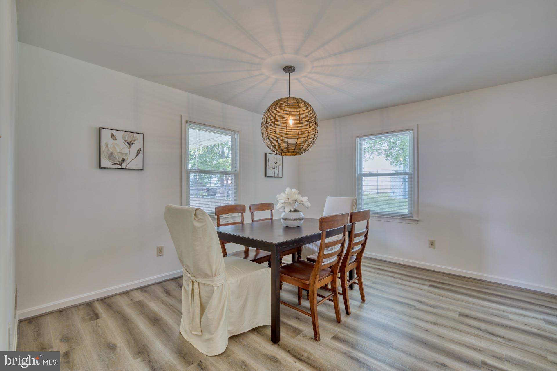 7725 Fordson Road Alexandria, VA 22306 - Photo 8 of 46 Dining area with modern globe pendant light
