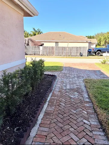 a view of a swimming pool and deck