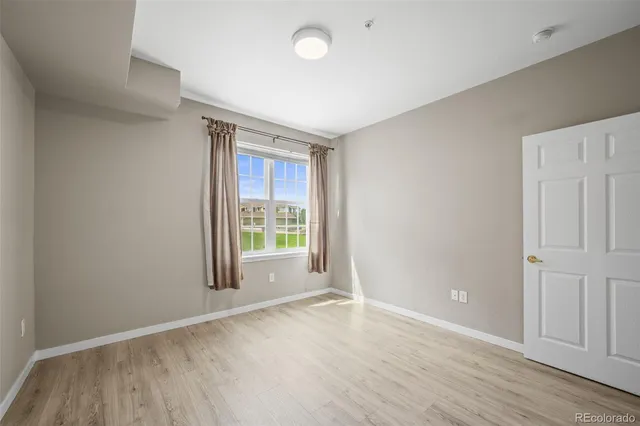 a view of storage and utility room with washer and dryer