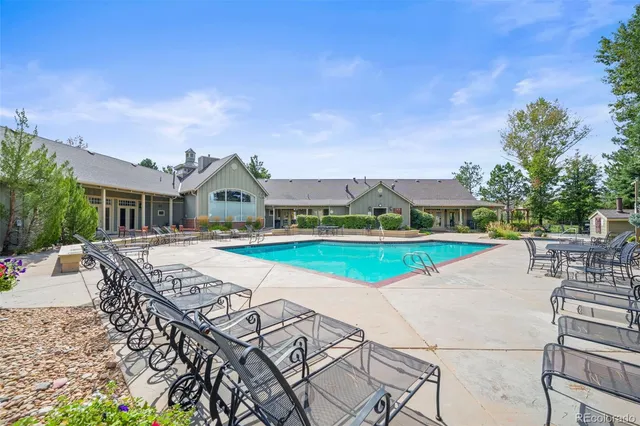 a view of a swimming pool with a patio