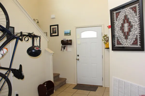 a bathroom with a shower and a mirror