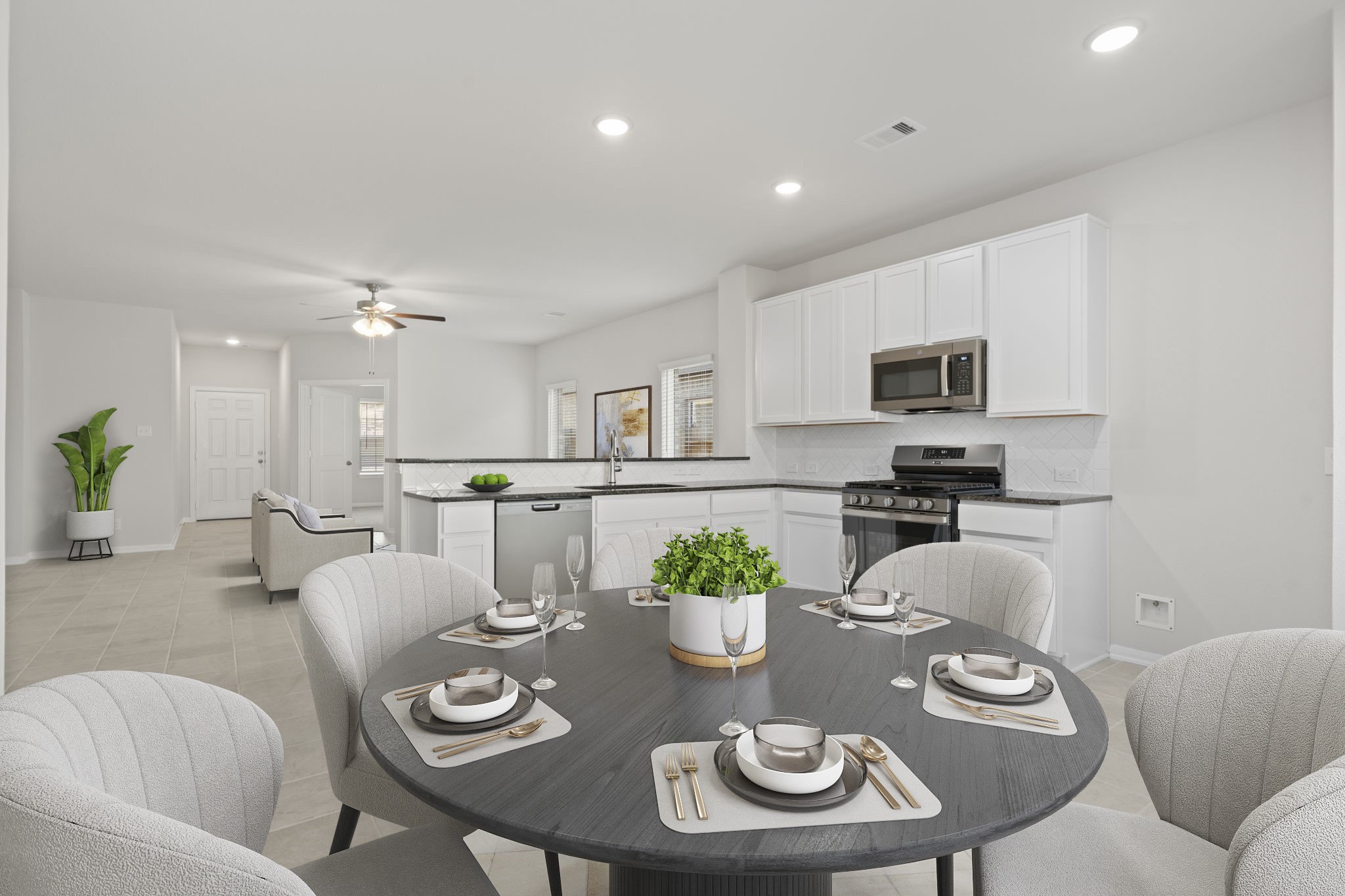 22218 Rome Breeze Drive Hockley, TX 77447 - Photo 15 of 34 Virtually staged to highlight its spaciousness, the breakfast area feels bright and cheerful with natural light pouring in from the surrounding windows—ideal for both casual meals and morning coffee.