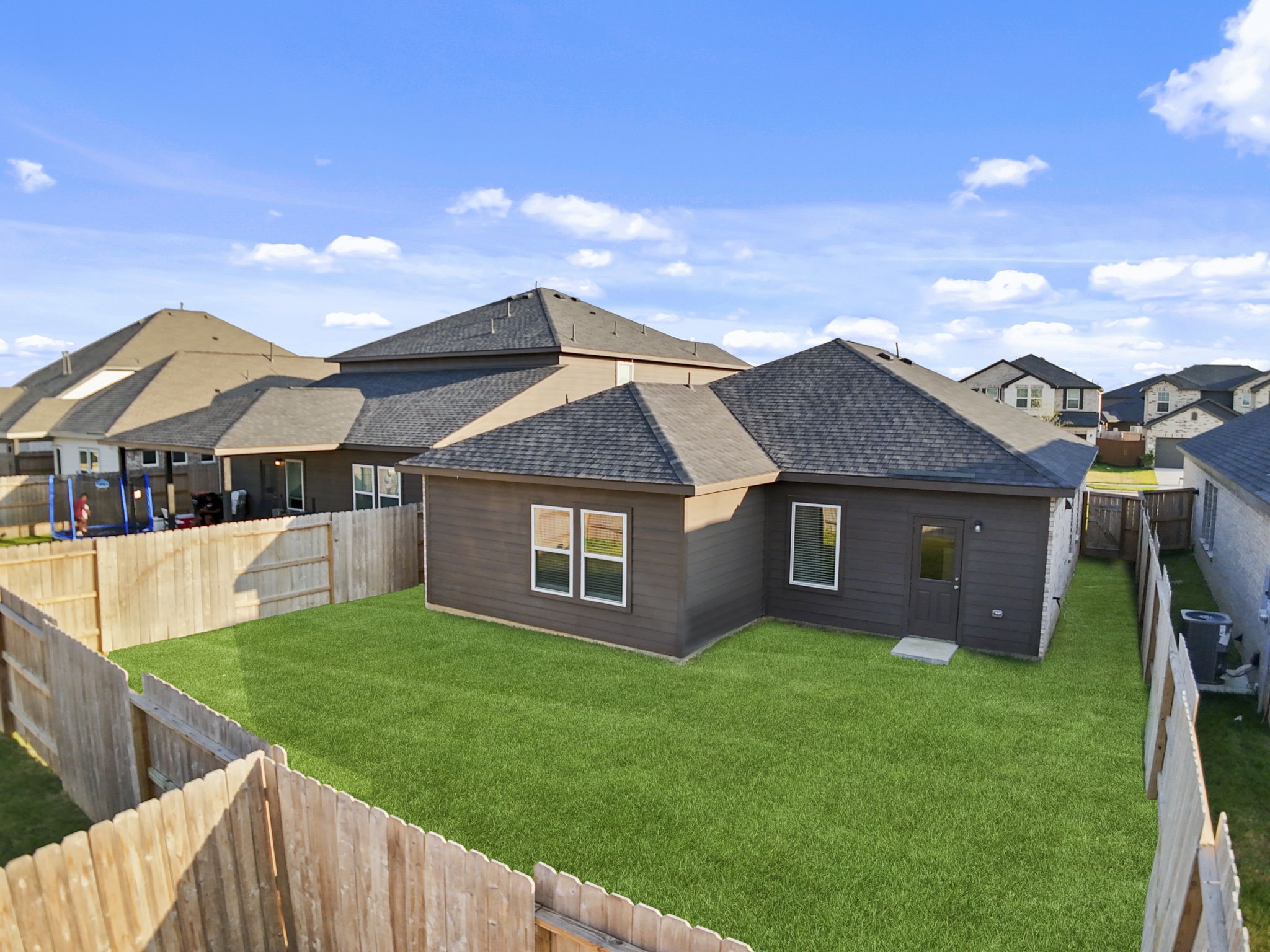 22218 Rome Breeze Drive Hockley, TX 77447 - Photo 24 of 34 A look at the spacious backyard from above highlights the generous green space, ideal for outdoor entertaining, gardening, furry friends and more!