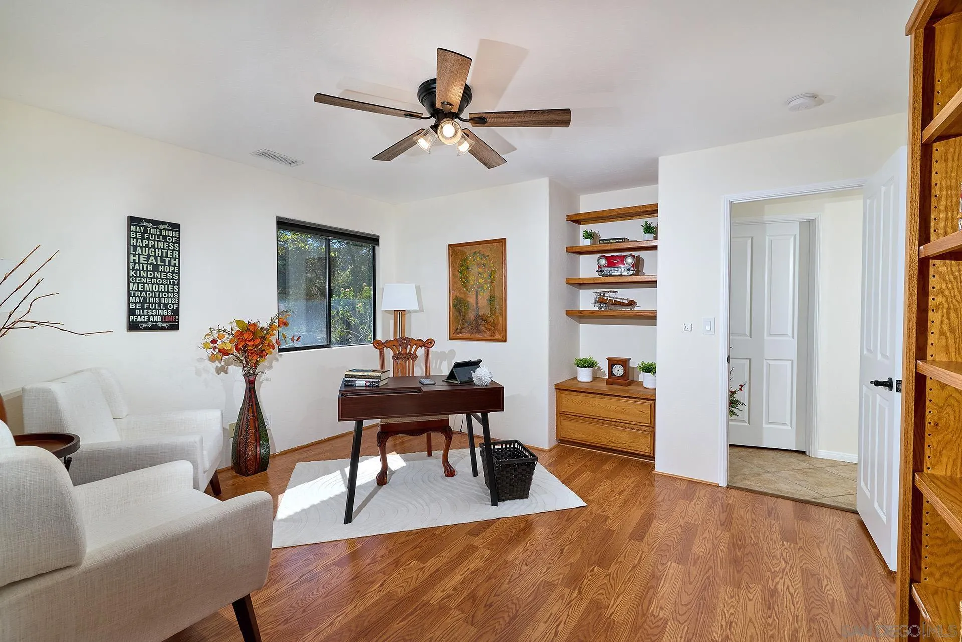 13588 McNally Road Valley Center, CA 92082 - Photo 29 of 43 a living room with furniture and a wooden floor
