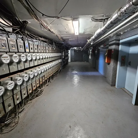 a view of an empty room with stairs