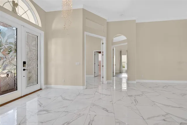 a view of a hallway with entryway