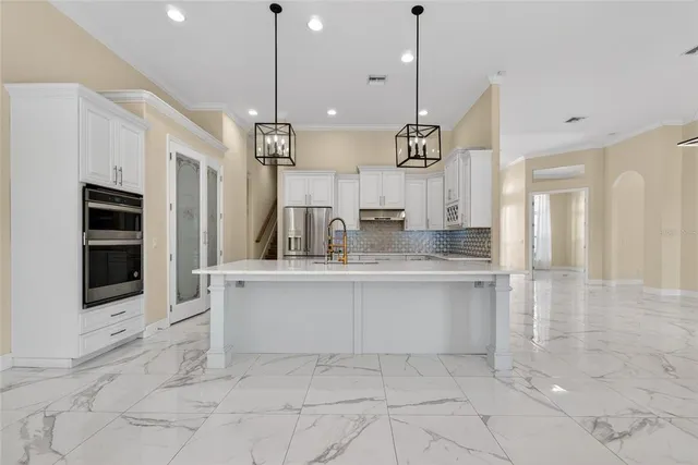 a view of livingroom with kitchen