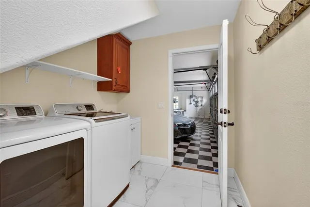 a bedroom with a bed and a mirror