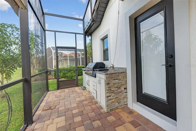 a view of swimming pool with patio