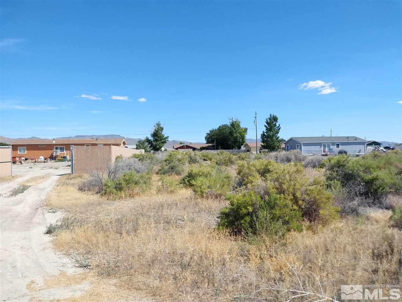 0 Reservoir Road, Unit 6 Lovelock, NV 89419 - Photo 5 of 6 a view of a dry yard with wooden fence