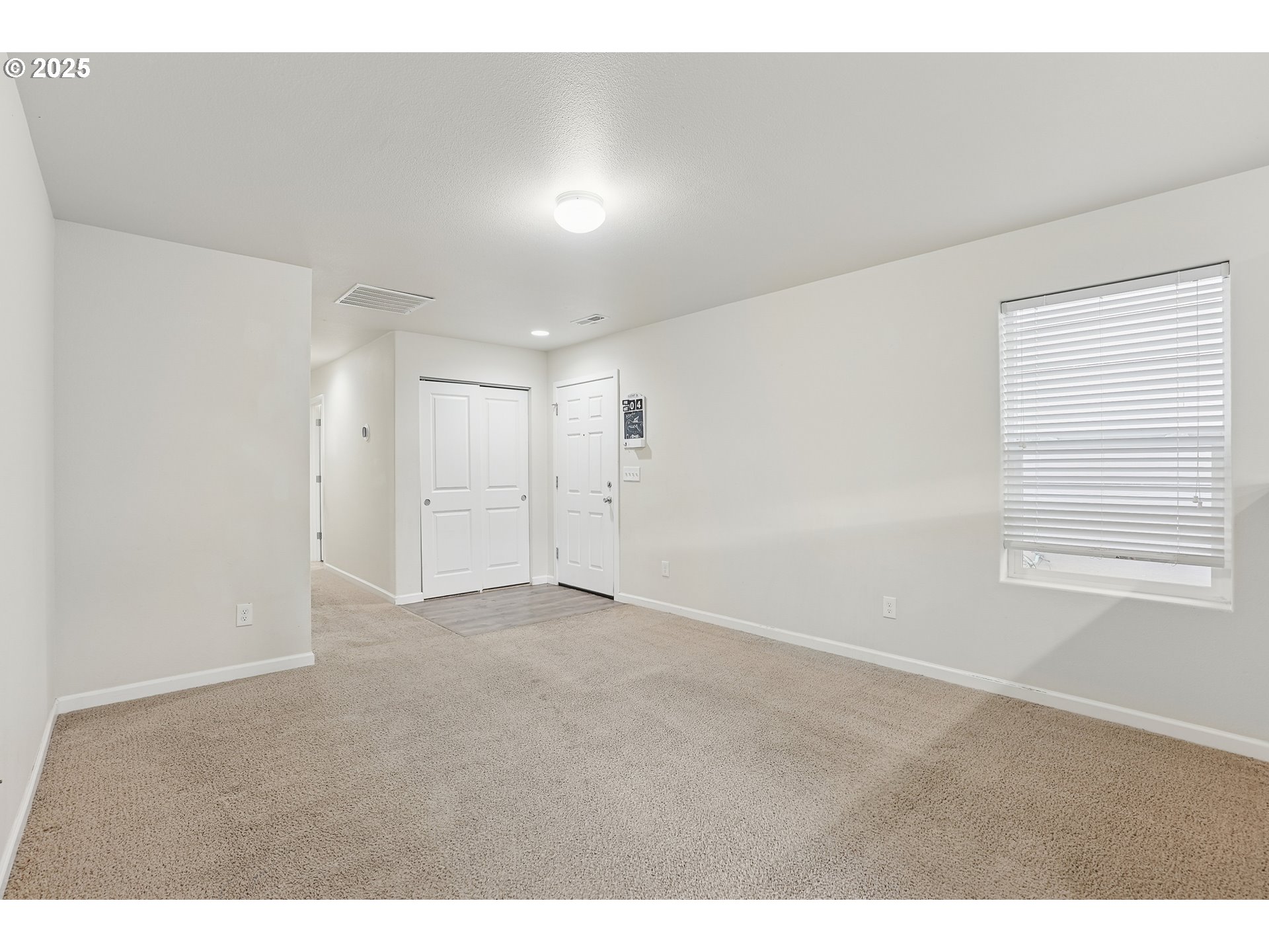 902 South View Drive Molalla, OR 97038 - Photo 3 of 24 a view of an empty room with a window