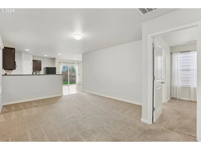 a view of a kitchen with a sink