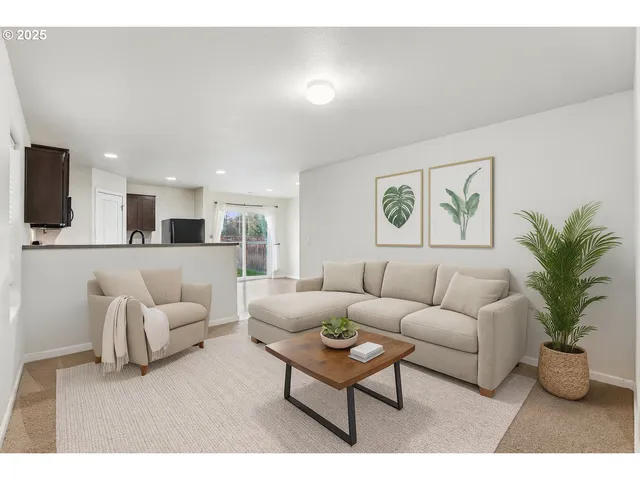 a living room with furniture or couch and a flat screen tv