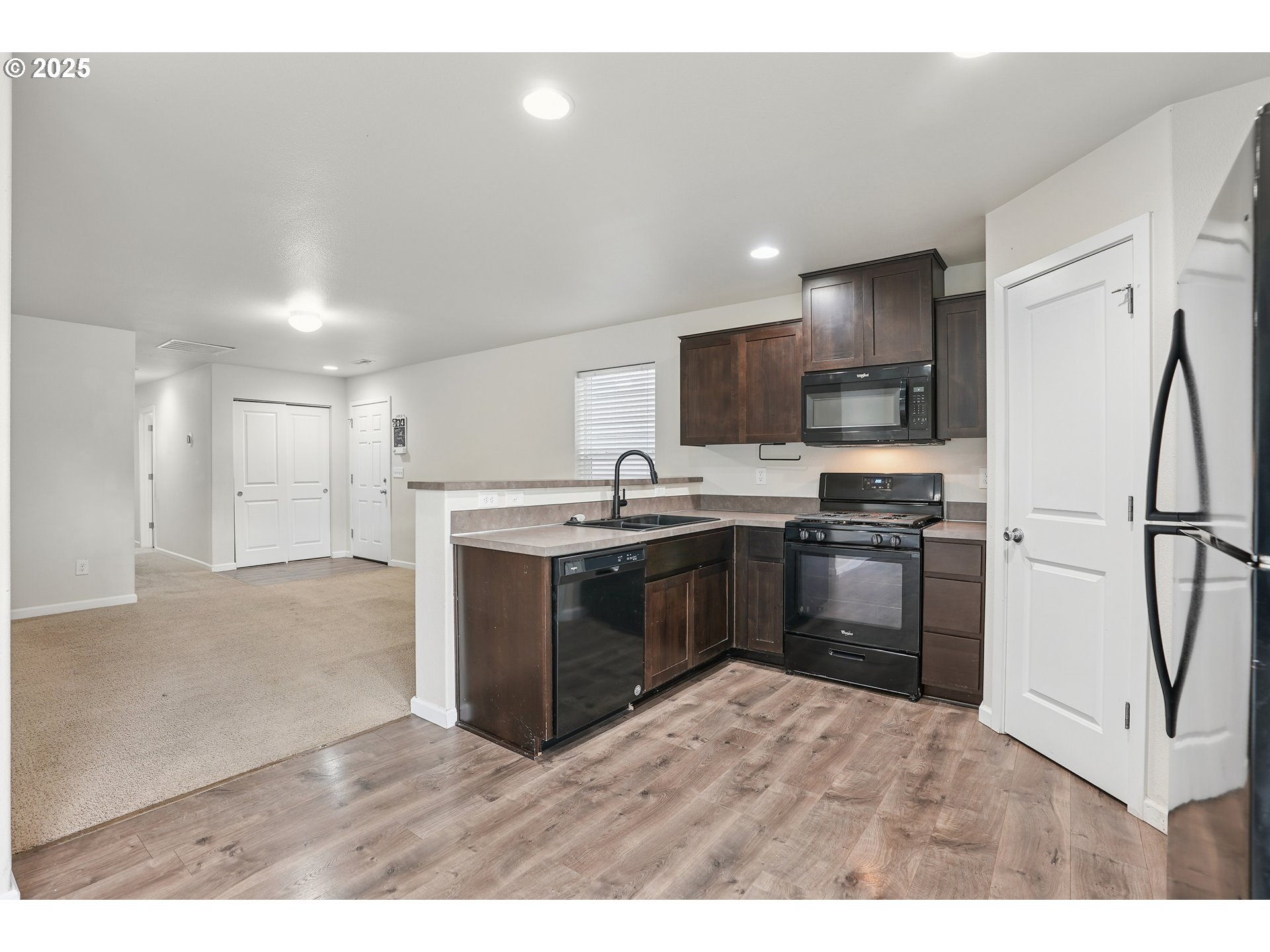 902 South View Drive Molalla, OR 97038 - Photo 7 of 24 a kitchen with a sink appliances and cabinets