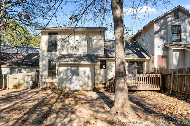 a view of a brick house with a large windows