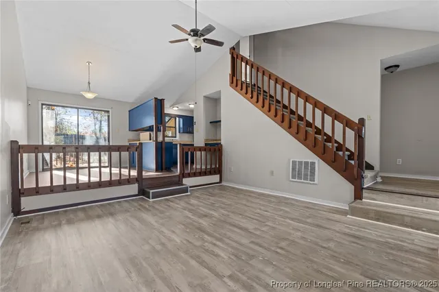 a view of an entryway wooden floor