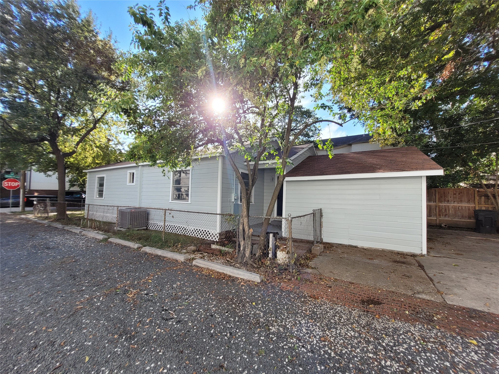 4302 Dickson Street Houston, TX 77007 - Photo 6 of 21 a view of a house with a yard and garage