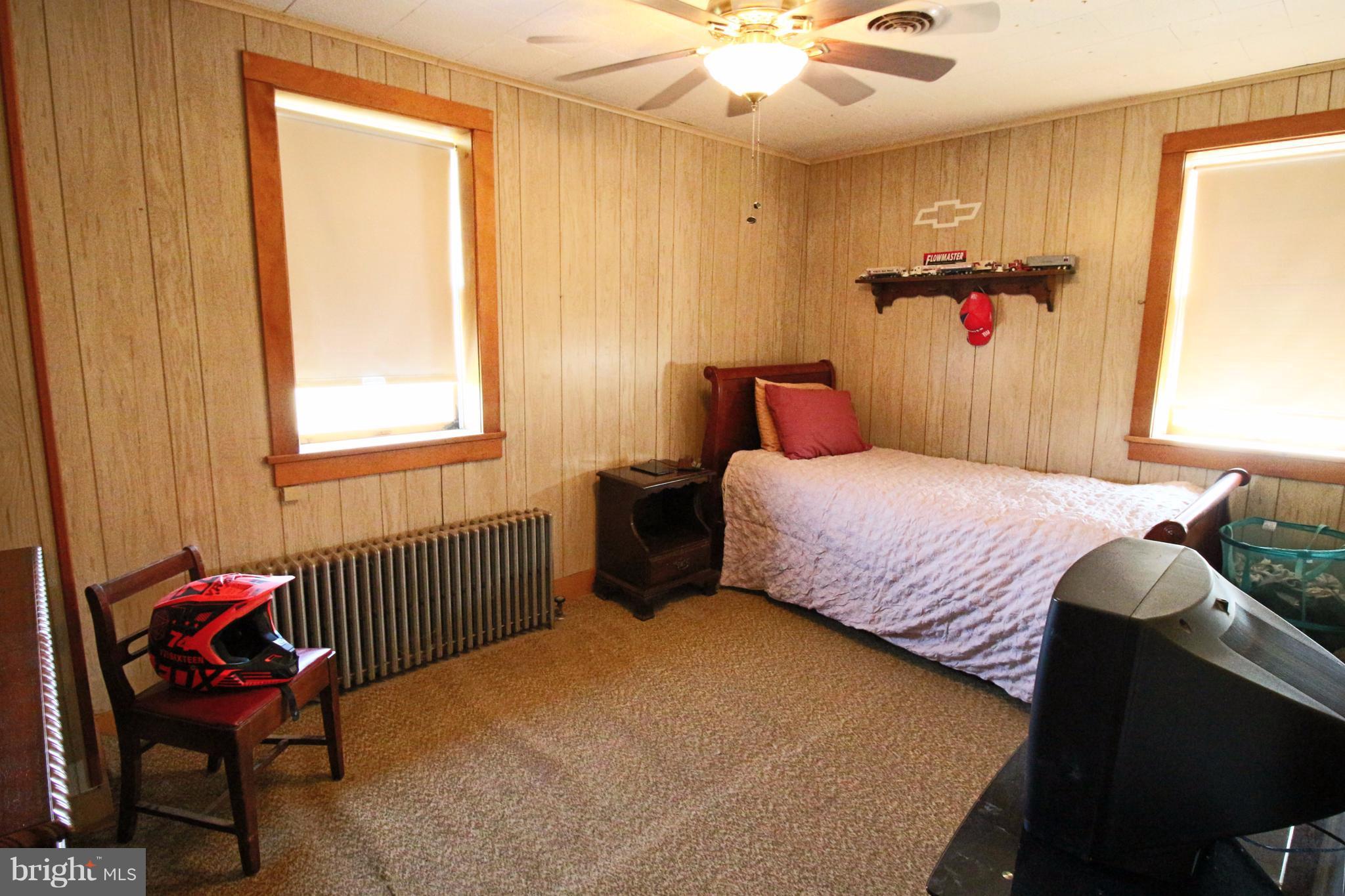 12949 Detour Road Keymar, MD 21757 - Photo 15 of 30 a bedroom with a bed and a window