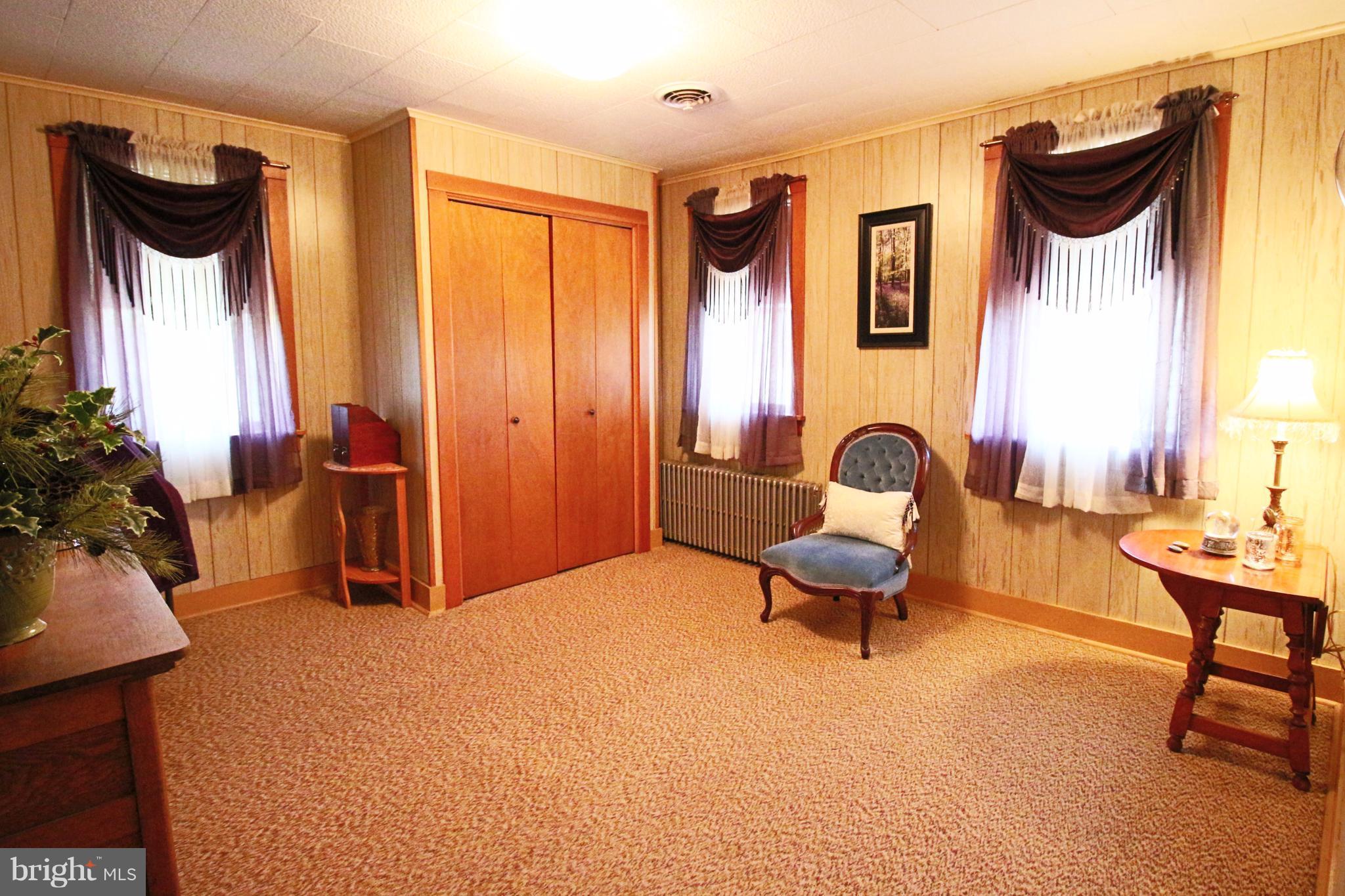 12949 Detour Road Keymar, MD 21757 - Photo 16 of 30 a living room with furniture and a large window