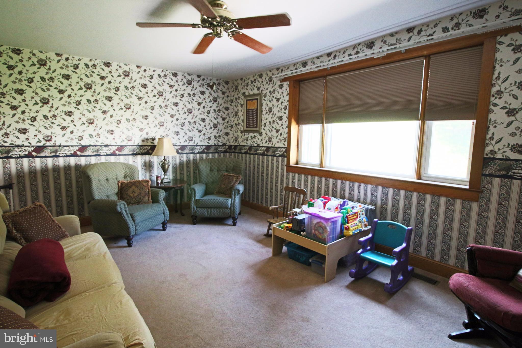12949 Detour Road Keymar, MD 21757 - Photo 7 of 30 a living room with furniture and a large window
