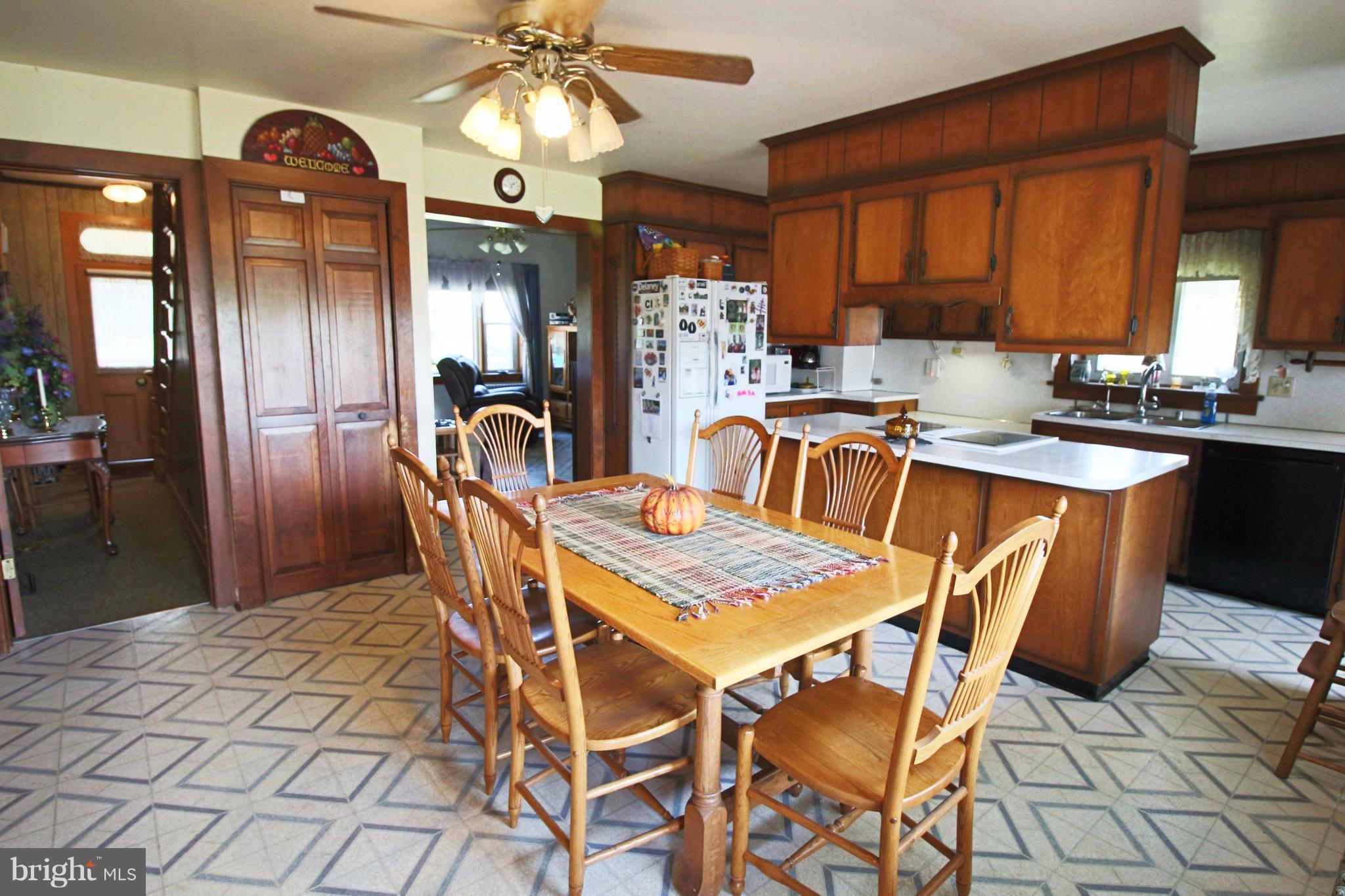 12949 Detour Road Keymar, MD 21757 - Photo 9 of 30 a dining table with chairs and window