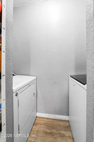 a balcony with wooden floor