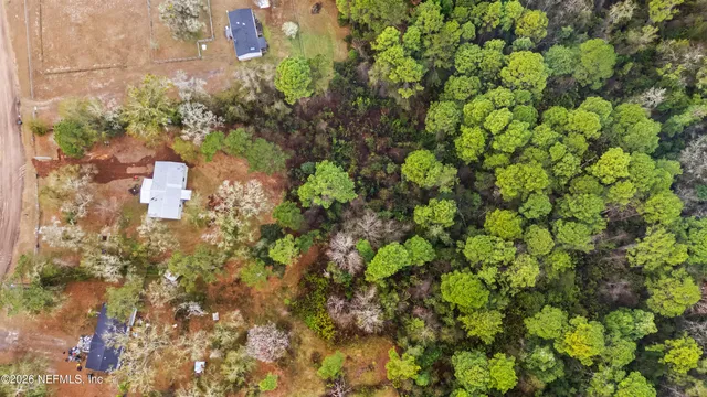 a view of a street with trees
