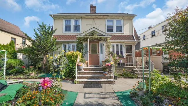a view of street along with house and trees