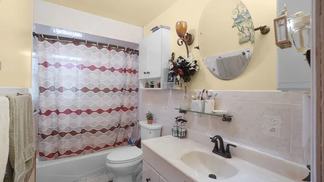 a bed room with furniture and a chandelier