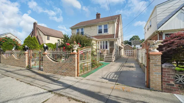 a view of a chairs and table in backyard